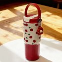 Kubek termiczny z uchwytem i ustnikiem, czerwony w wisienki 750ml BD57